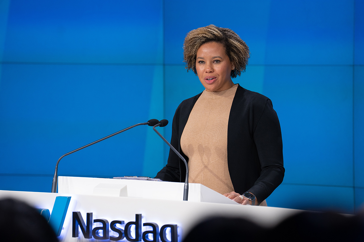 Aja Hill, ECON '07, cheering at Nasdaq