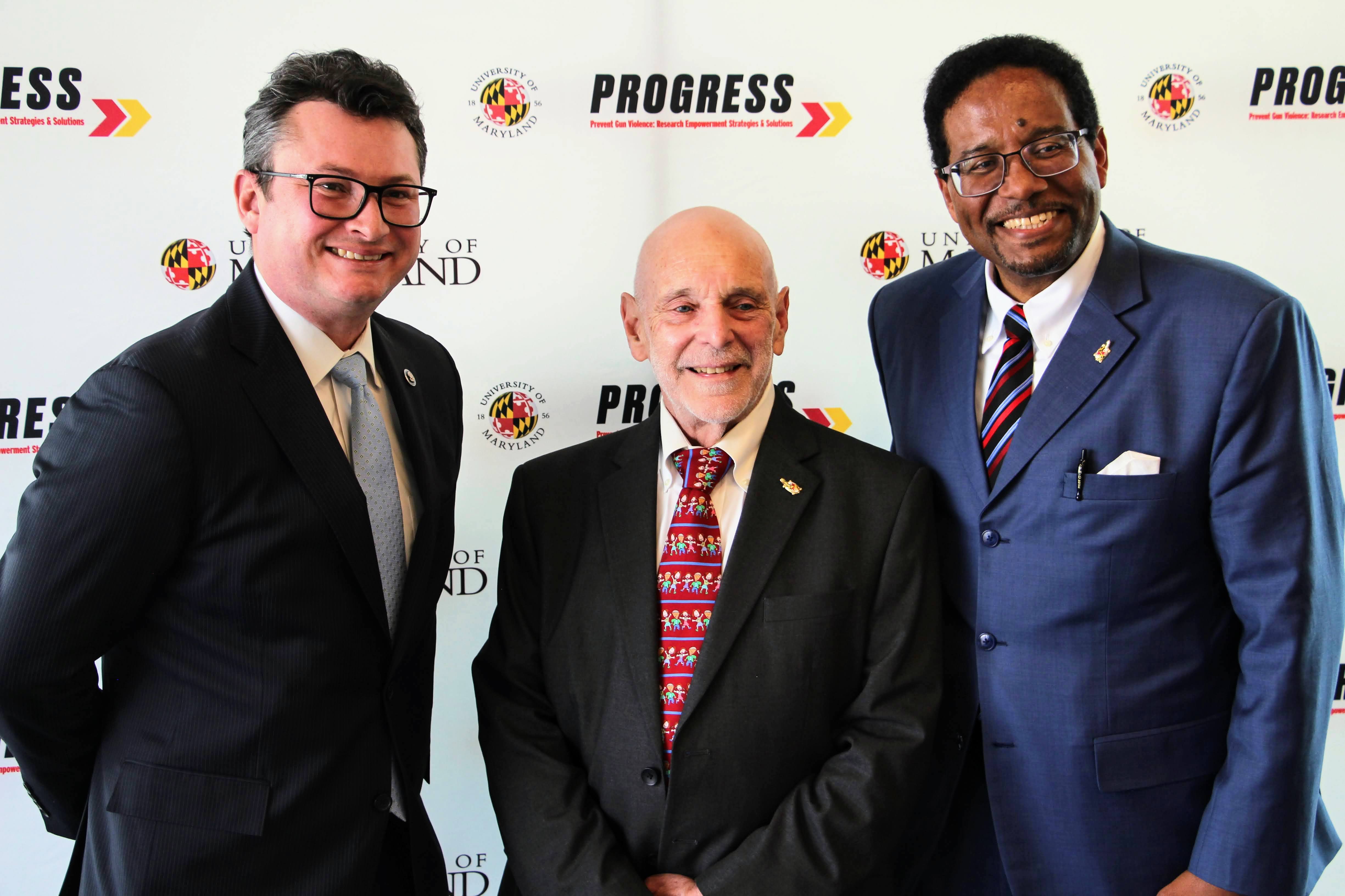 WHOGVP Deputy Director Rob Wilcox (L), PROGRESS Co-Director Woodie Kessel (C), and UMD President Daryll Pines (R).