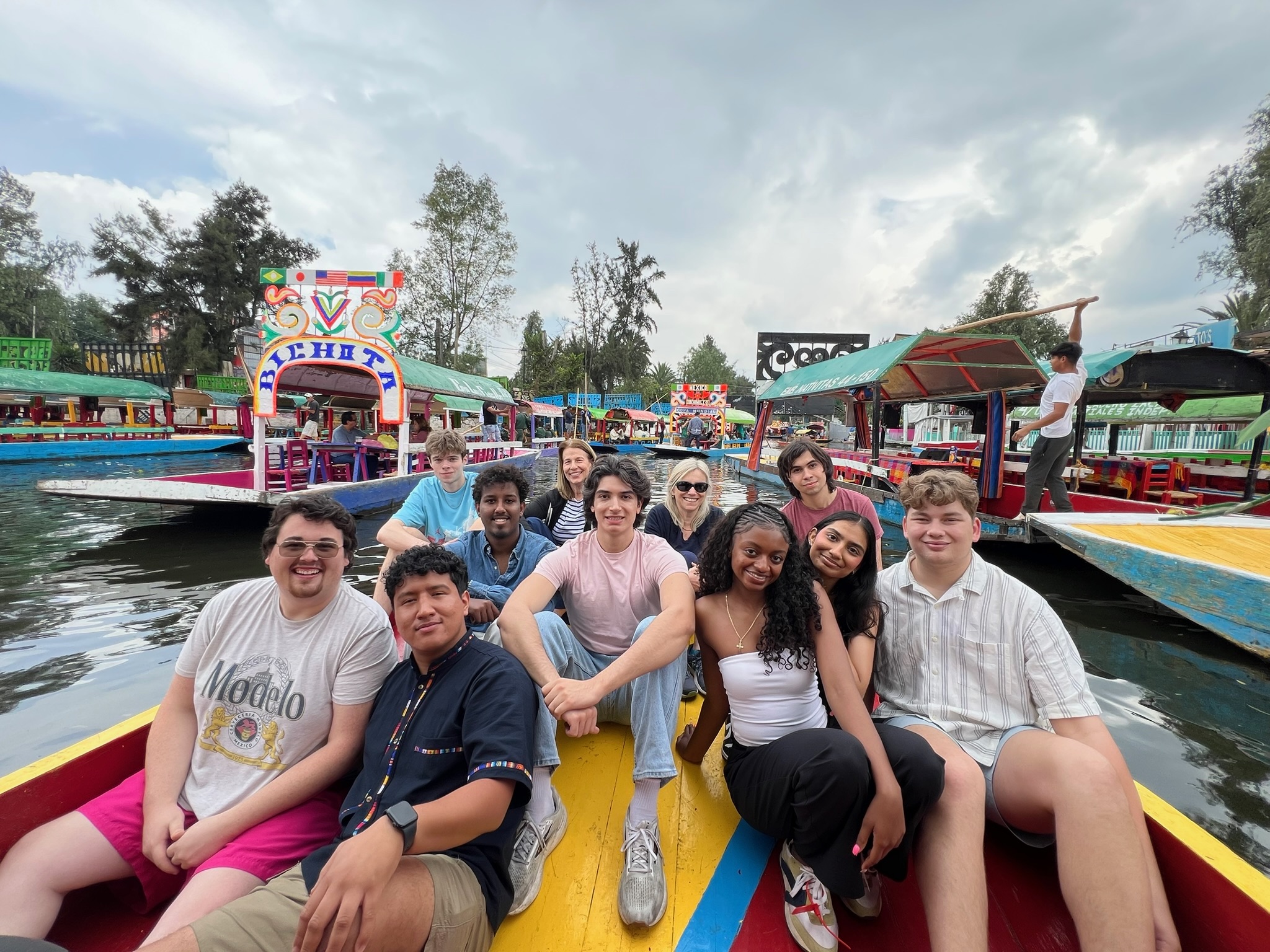 group photo of the students who went on the UMD Department of Economics' first study abroad trip to Mexico, on a boat together in Mexico