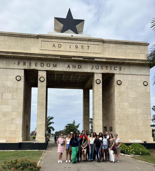 inaugural HESP-GPS cohort gather under the Independence Arch in Accra, Ghana