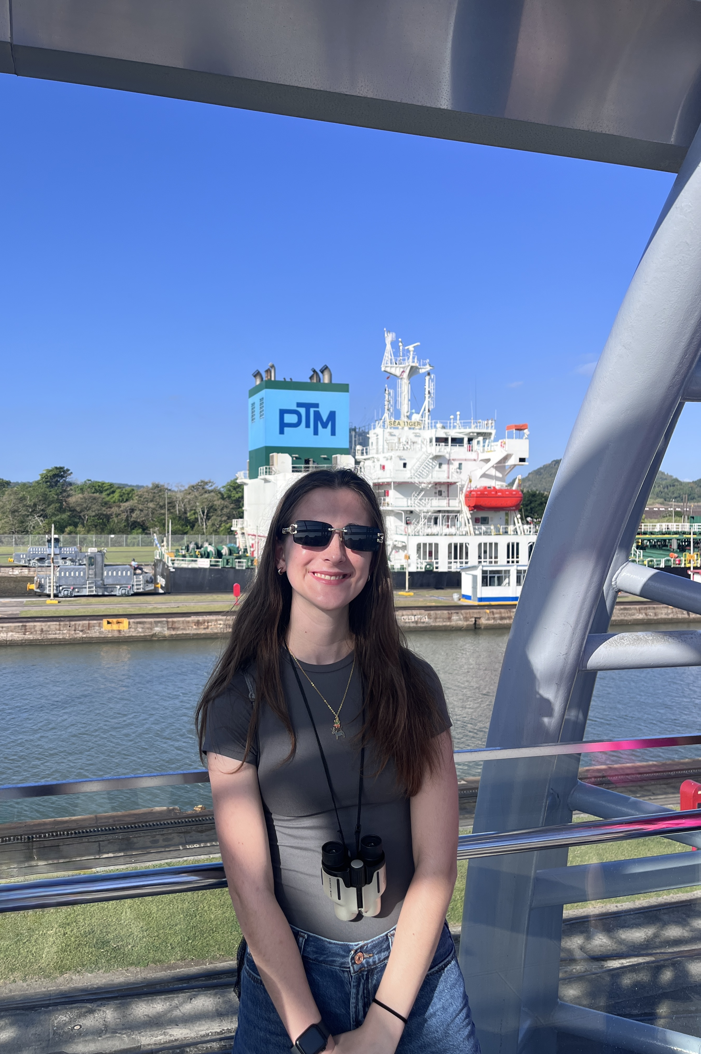 Photo of Kathryn Daniel, in front of the Panama Canal