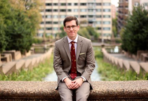 Brock McGoff, in front of fountain