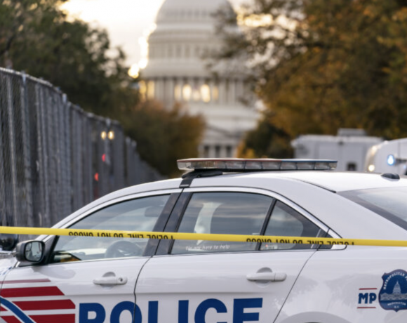 Police car in front of capitol building