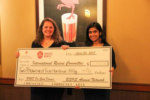 BSOS Alumni Chapter Board President Ilana Cohen presents a check to Preethi Nampoorthiri with the IRC of Silver Spring.
