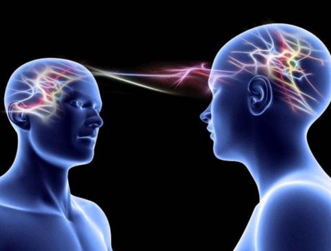 Image demonstrating shared brain waves between two humans.