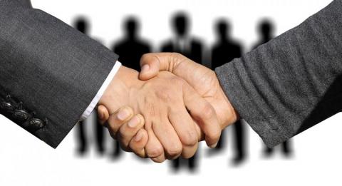 two men shaking hands