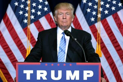 Donald Trump at a podium.