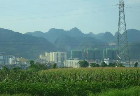 Urbanization is visible in a formerly remote region of Guizhou Province, China. Photo by Louis Putzel for CIFOR.