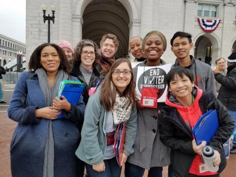 A group of Sociology faculty members and students gather before the Women's March in Washington, DC.